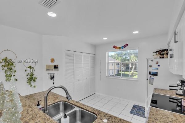 14817 Balgowan Road, Unit 2015 Miami Lakes, FL 33016 - Photo 21 of 39 a view of a livingroom with a window