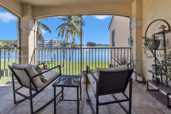 14817 Balgowan Road, Unit 2015 Miami Lakes, FL 33016 - Photo 22 of 39 a view of a chairs in balcony