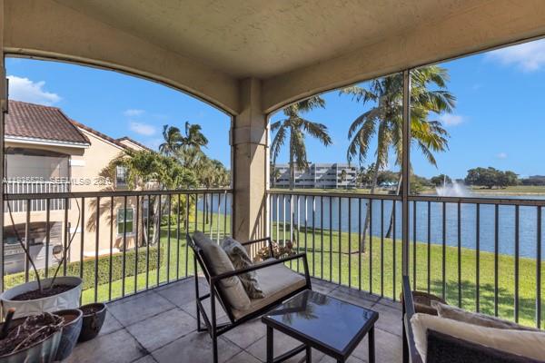 14817 Balgowan Road, Unit 2015 Miami Lakes, FL 33016 - Photo 25 of 39 a view of a chairs on the roof deck