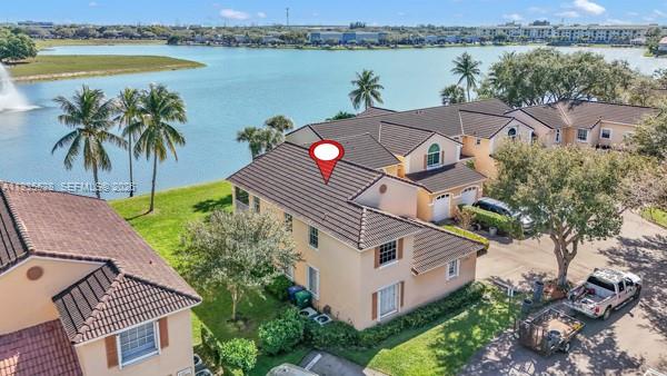 14817 Balgowan Road, Unit 2015 Miami Lakes, FL 33016 - Photo 38 of 39 an aerial view of a house with outdoor space and lake view