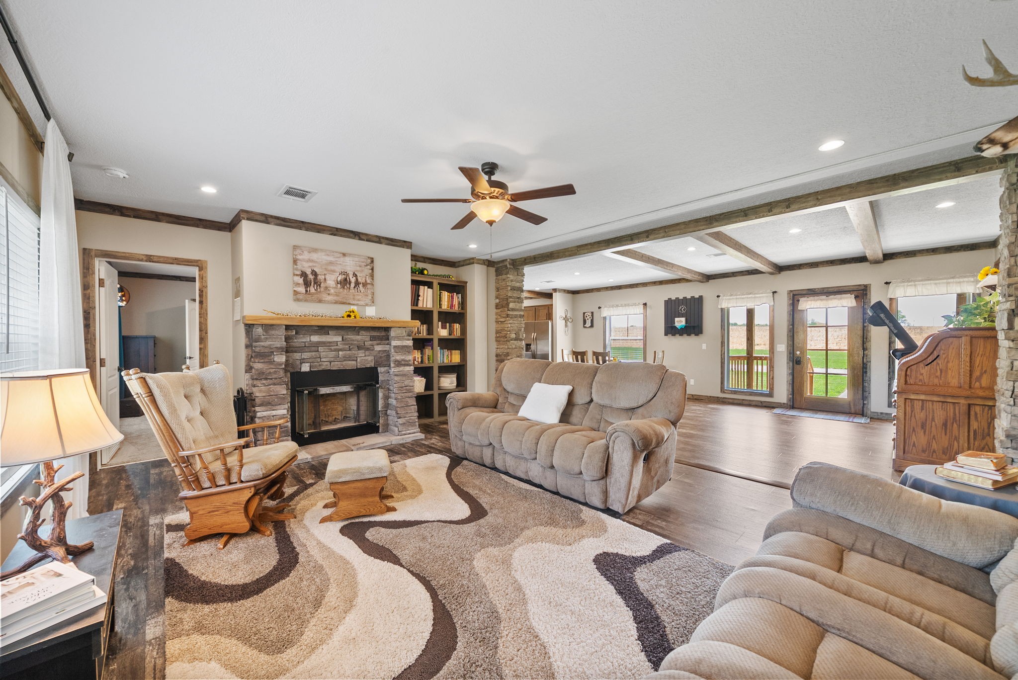 164 Meredith Lane Guthrie, KY 42234 - Photo 15 of 57 a living room with furniture a fireplace and a chandelier