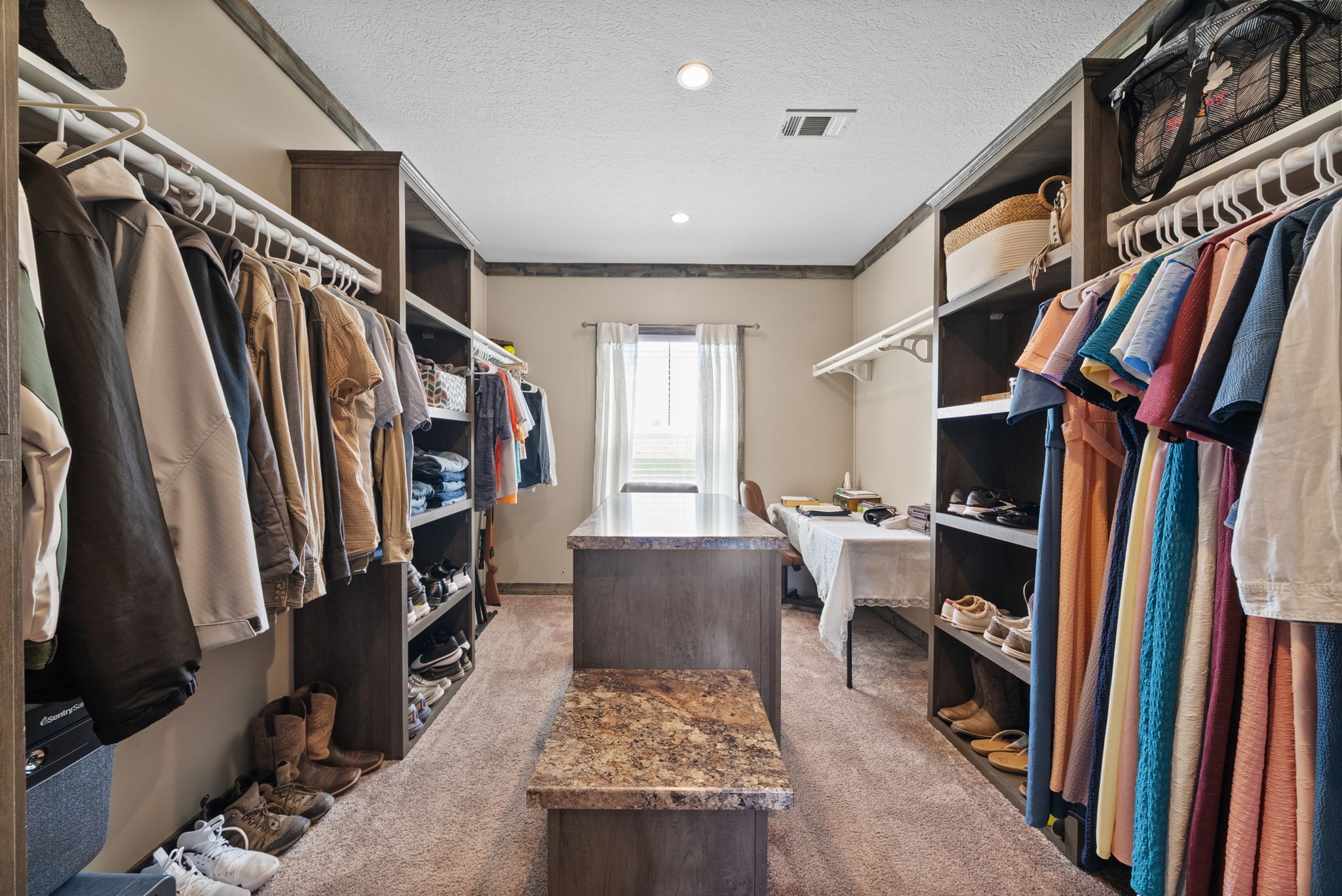 164 Meredith Lane Guthrie, KY 42234 - Photo 19 of 57 a view of walk in closet with clothes and shoes