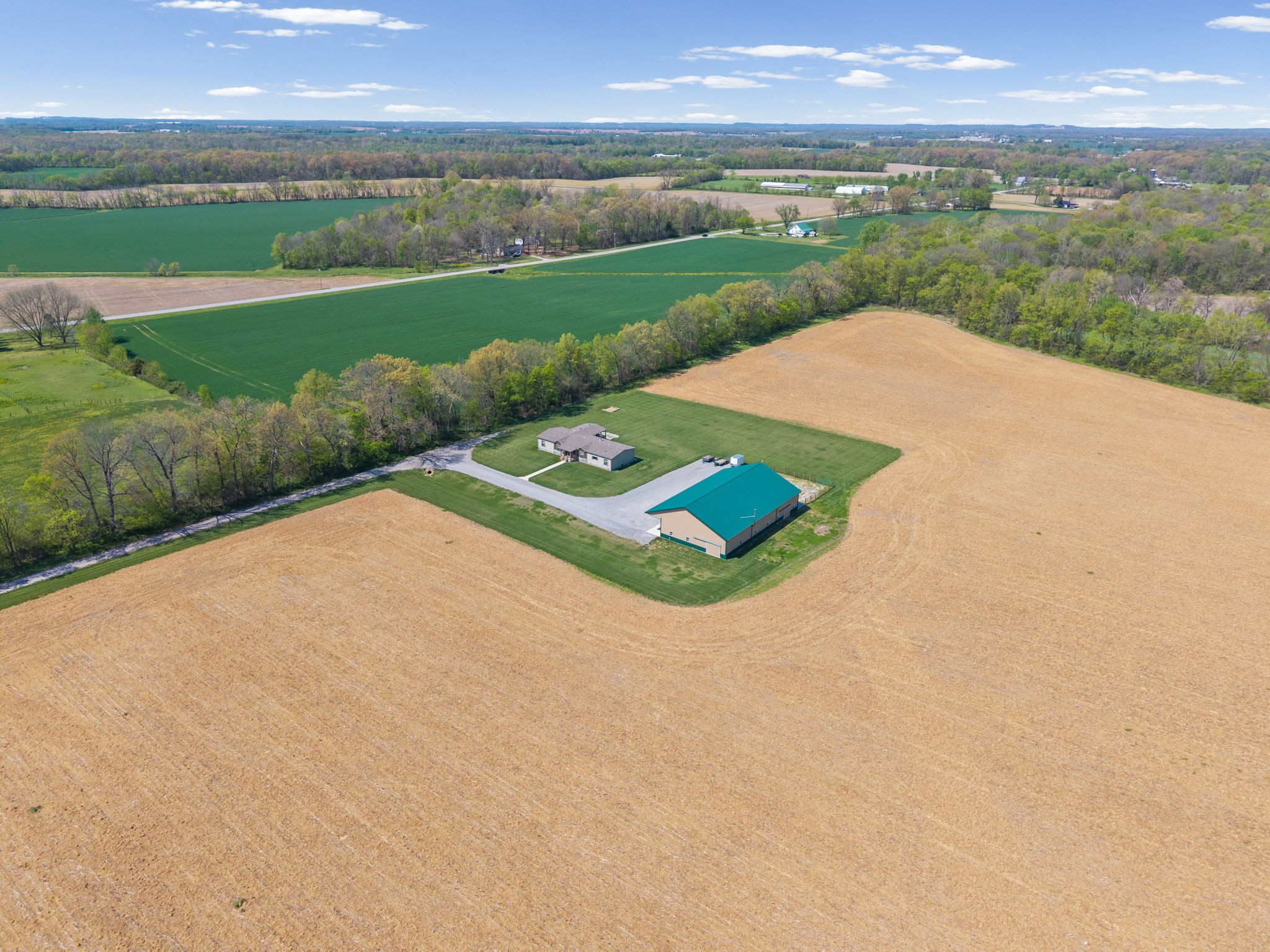 164 Meredith Lane Guthrie, KY 42234 - Photo 2 of 57 an aerial view of a house with a yard