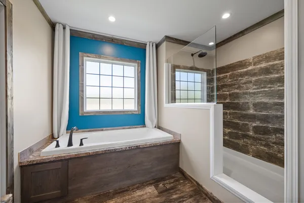 a bathroom with a bathtub and a sink