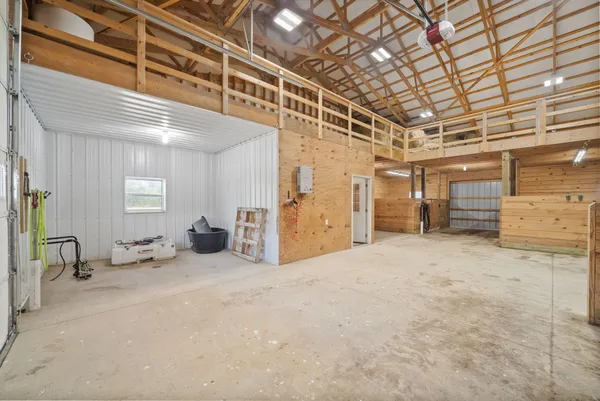 a view of an empty room with a door