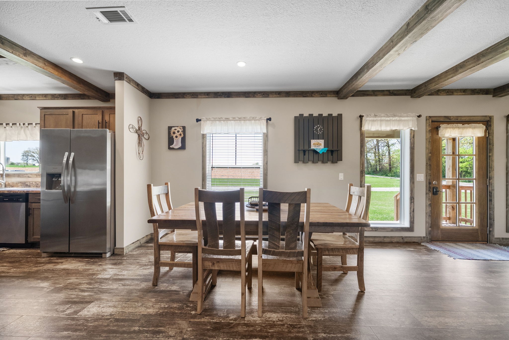 164 Meredith Lane Guthrie, KY 42234 - Photo 7 of 57 a view of a dining room with furniture and wooden floor