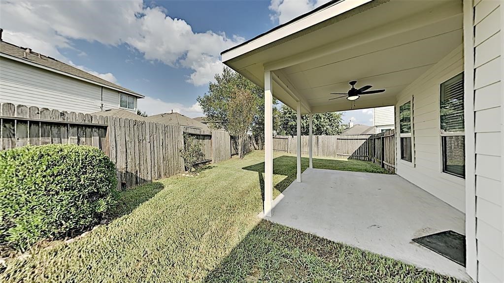 21338 Bella Flora Court Spring, TX 77379 - Photo 10 of 10 a view of a backyard