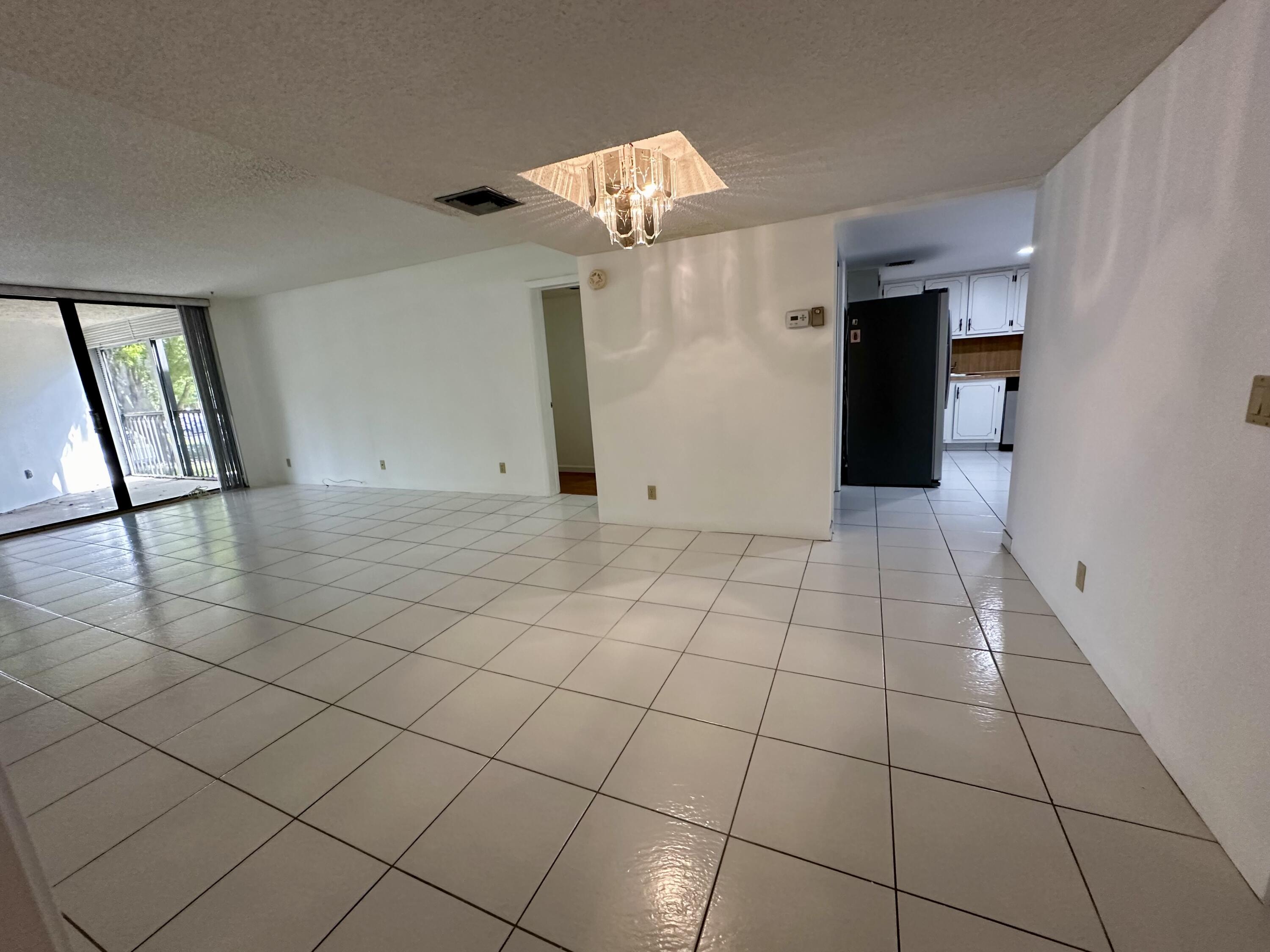 16200 Golf Club Road, Unit 206 Weston, FL 33326 - Photo 9 of 39 Living/Dining Room