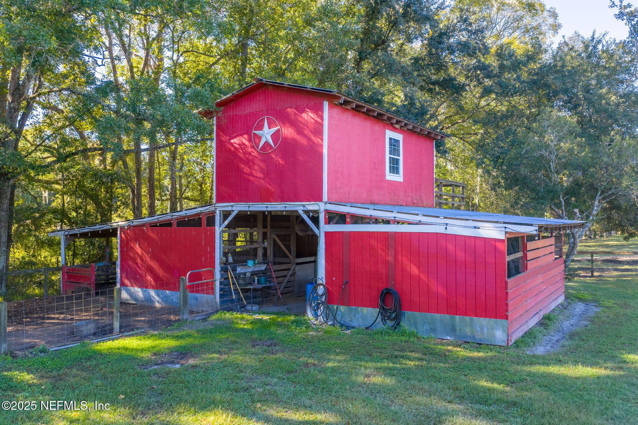 4299 Hawk Haven Road Middleburg, FL 32068 - Photo 9 of 100 View of 4 stall barn