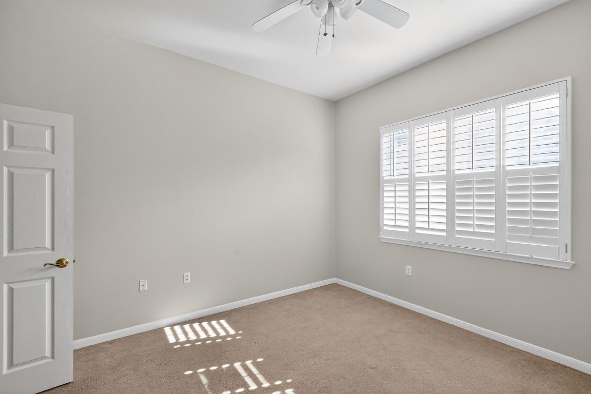 130 Crepe Myrtle Lane Georgetown, TX 78633 - Photo 18 of 33 a view of an empty room with a window