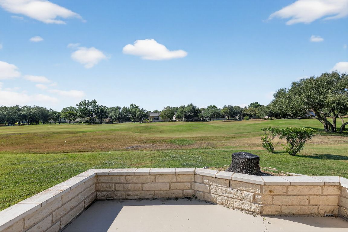 130 Crepe Myrtle Lane Georgetown, TX 78633 - Photo 27 of 33 a view of lake with table and chairs