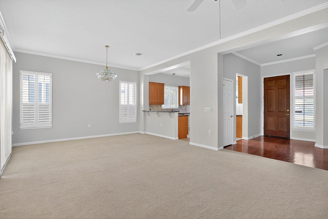 130 Crepe Myrtle Lane Georgetown, TX 78633 - Photo 3 of 33 an empty room with windows and entrance