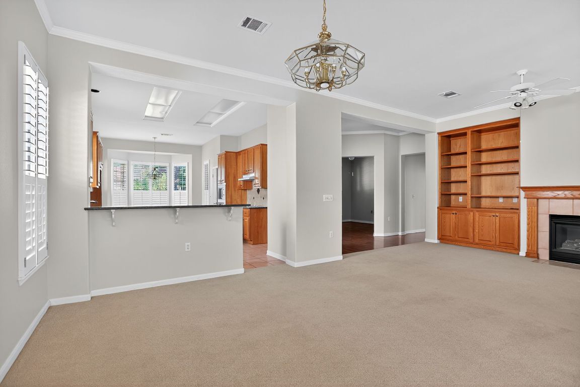 130 Crepe Myrtle Lane Georgetown, TX 78633 - Photo 5 of 33 a view of a big room with windows and cabinet