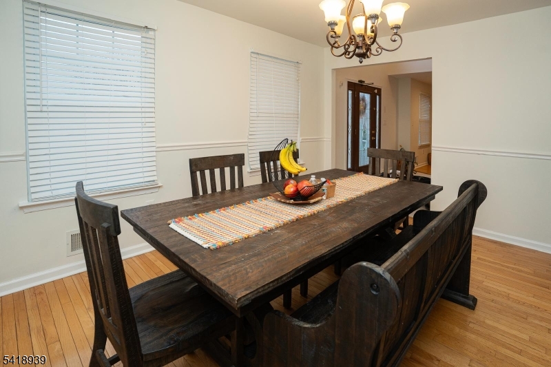 54 Campbell Road Hillsborough, NJ 08844 - Photo 14 of 31 a view of a dining room with furniture window and wooden floor
