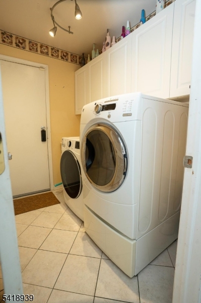 54 Campbell Road Hillsborough, NJ 08844 - Photo 15 of 31 a utility room with dryer and washer