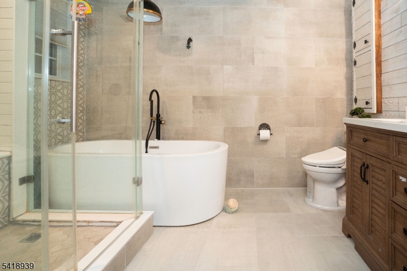 54 Campbell Road Hillsborough, NJ 08844 - Photo 17 of 31 a bathroom with a sink a toilet and shower