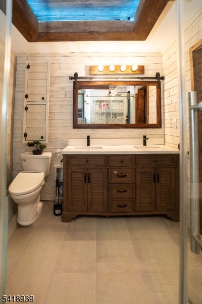 54 Campbell Road Hillsborough, NJ 08844 - Photo 18 of 31 a bathroom with a granite countertop toilet sink and mirror