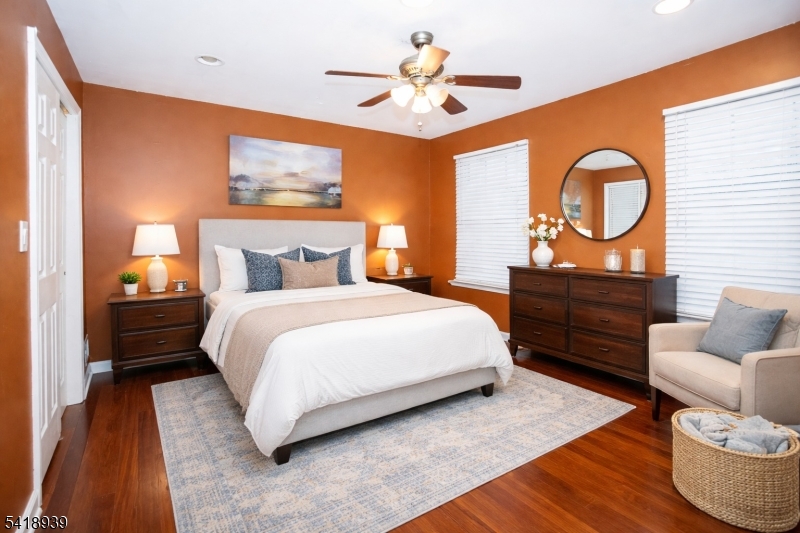 54 Campbell Road Hillsborough, NJ 08844 - Photo 19 of 31 a bedroom with a bed mirror and couch