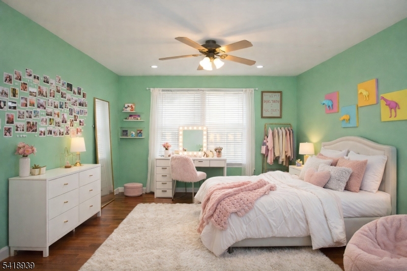 54 Campbell Road Hillsborough, NJ 08844 - Photo 20 of 31 a bedroom with a bed and a chandelier