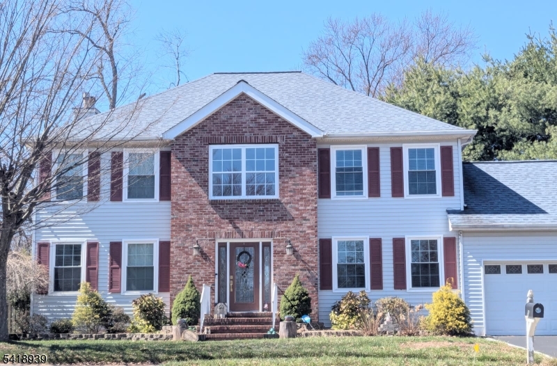 54 Campbell Road Hillsborough, NJ 08844 - Photo 2 of 31 a front view of a house with garden