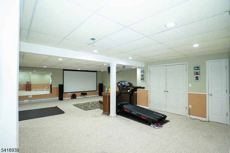 54 Campbell Road Hillsborough, NJ 08844 - Photo 27 of 31 a view of a room with gym equipment
