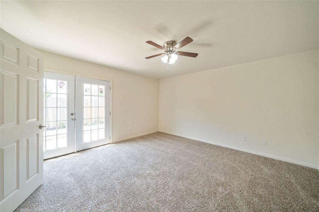 9926 Opal Rock Drive Rosharon, TX 77583 - Photo 3 of 8 a view of empty room with windows