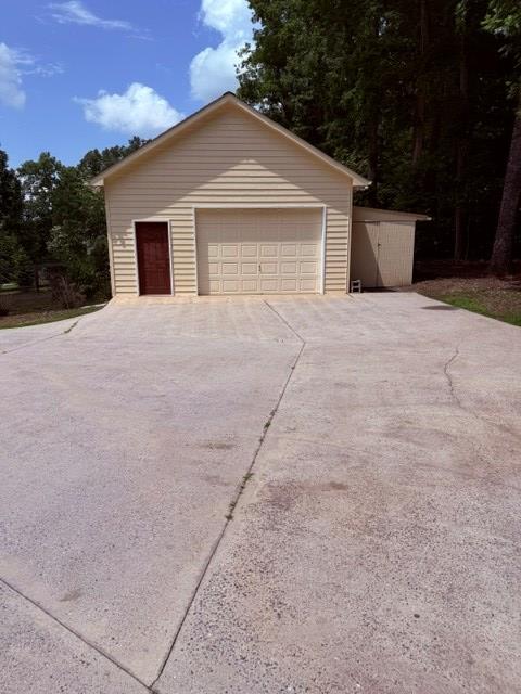 2948 Hendriske Road Young Harris, GA 30582 - Photo 20 of 20 a front view of a house with a yard and garage