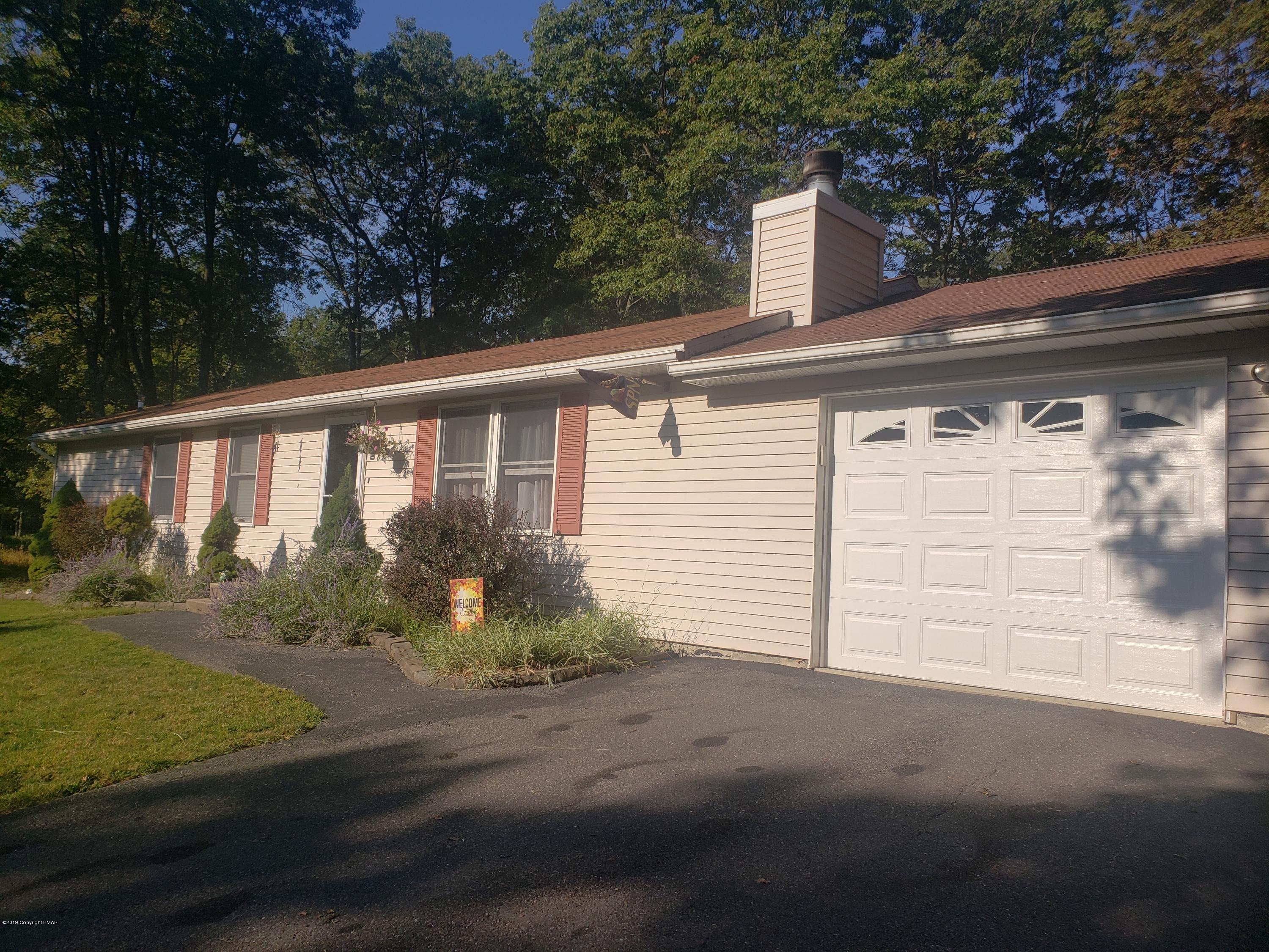 4307 Pine Ridge Drive West Bushkill, PA 18324 - Photo 2 of 28 a view of a house with a yard