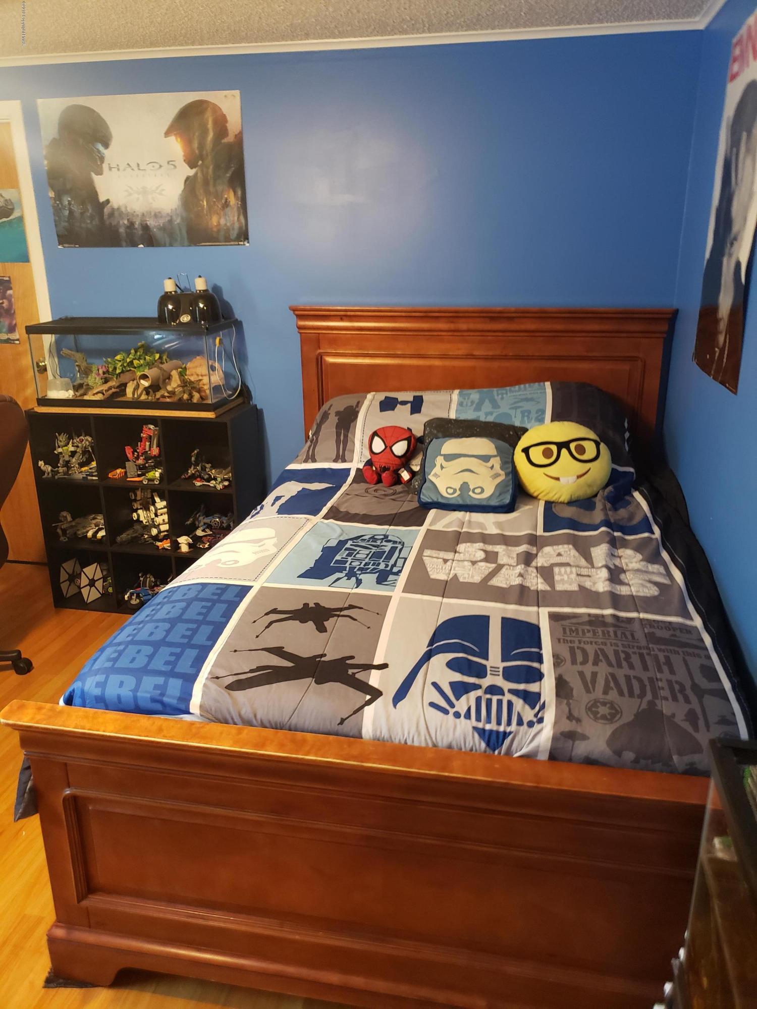 4307 Pine Ridge Drive West Bushkill, PA 18324 - Photo 21 of 28 a bedroom with a bed and dresser