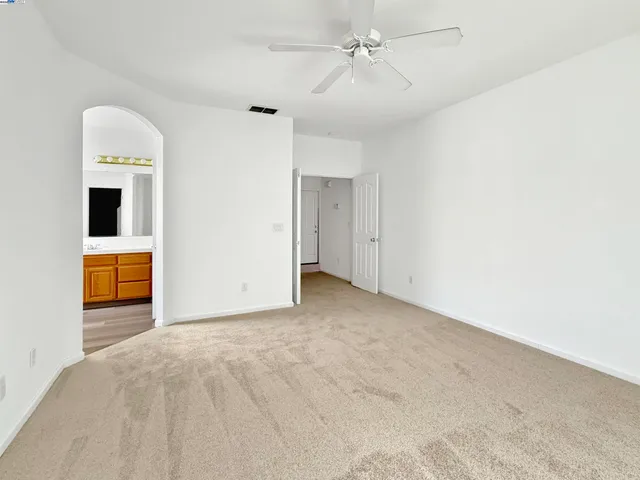a view of a livingroom with a staircase