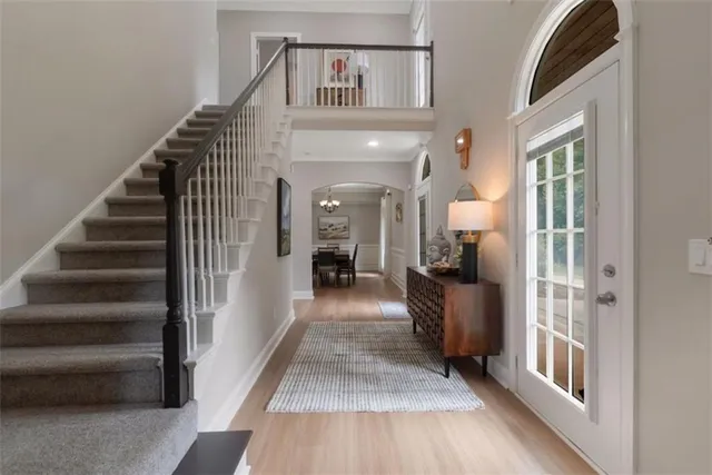 a view of a hallway view with staircase