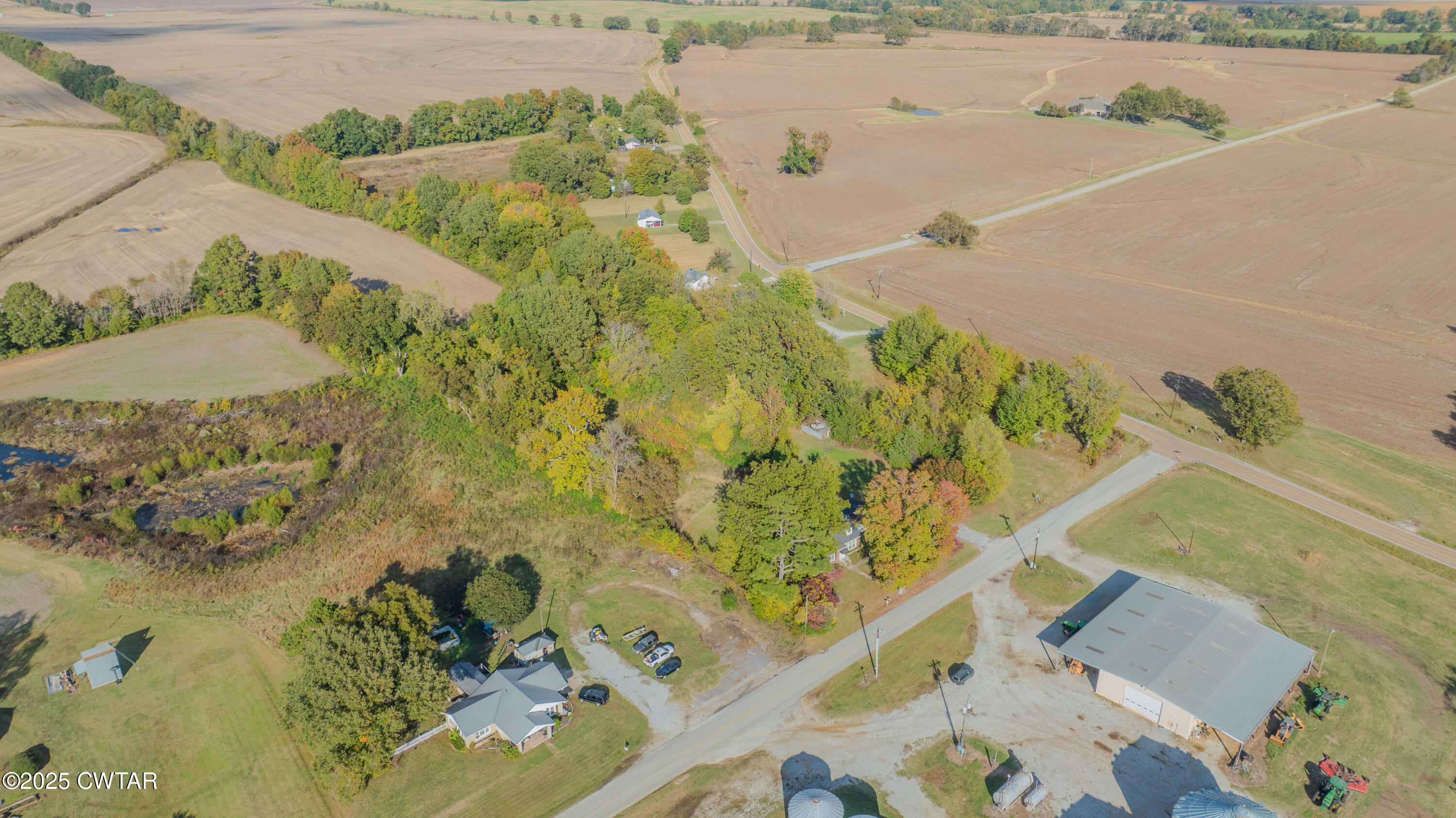 0 Rudolph Road Brownsville, TN 38012 - Photo 6 of 6 an aerial view of a house with a yard and lake view