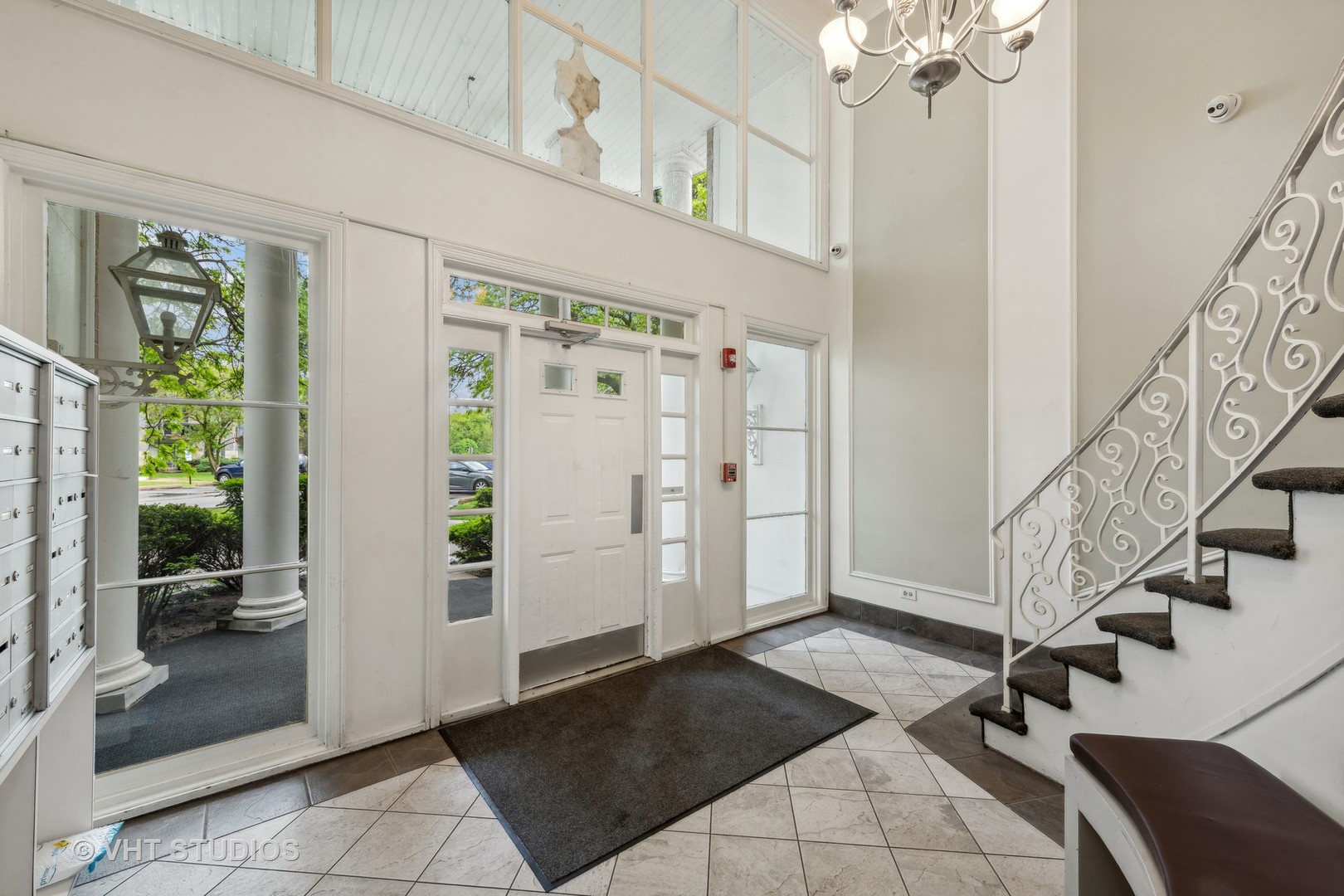 5300 Carriageway Drive, Unit 112 Rolling Meadows, IL 60008 - Photo 2 of 12 a view of an entryway with wooden floor
