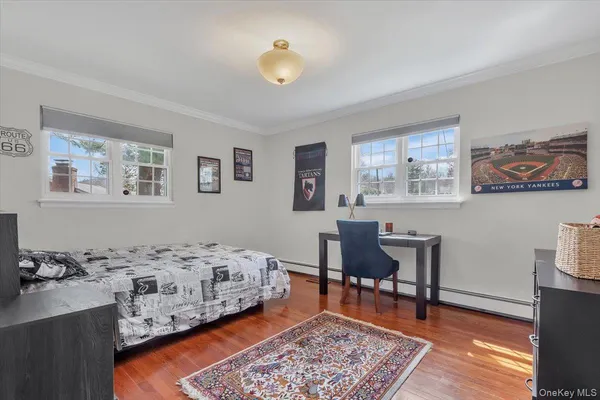 a bedroom with a bed and a table in it
