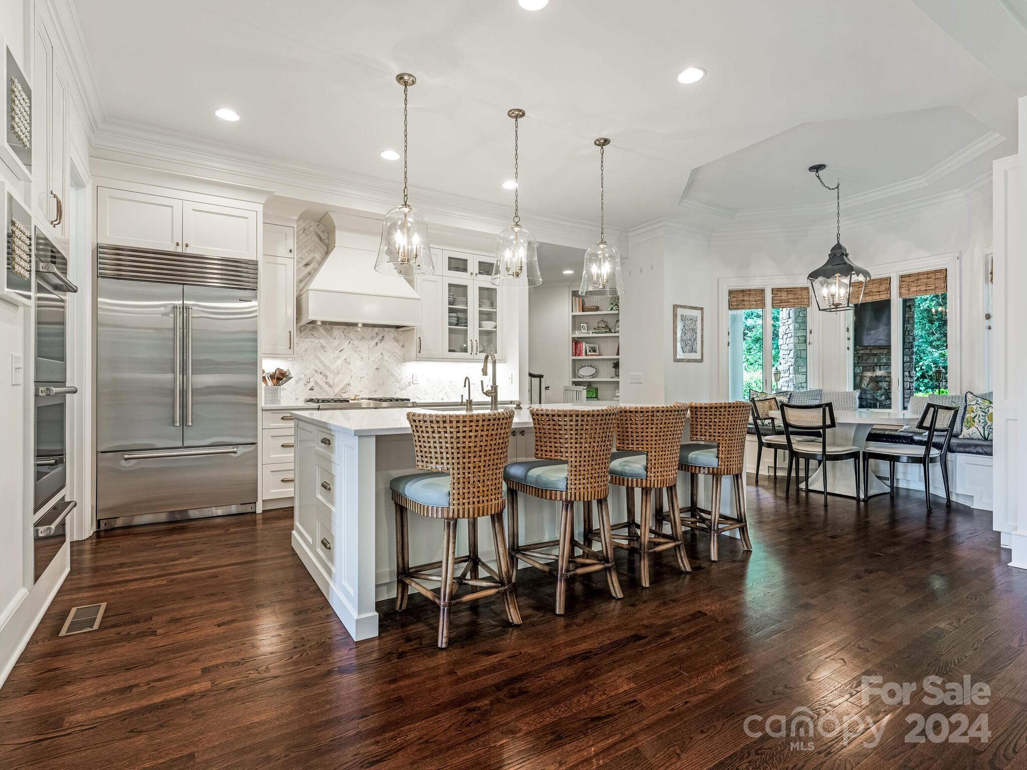 330 South Canterbury Road Charlotte, NC 28211 - Photo 16 of 41 a large kitchen with a table and chairs