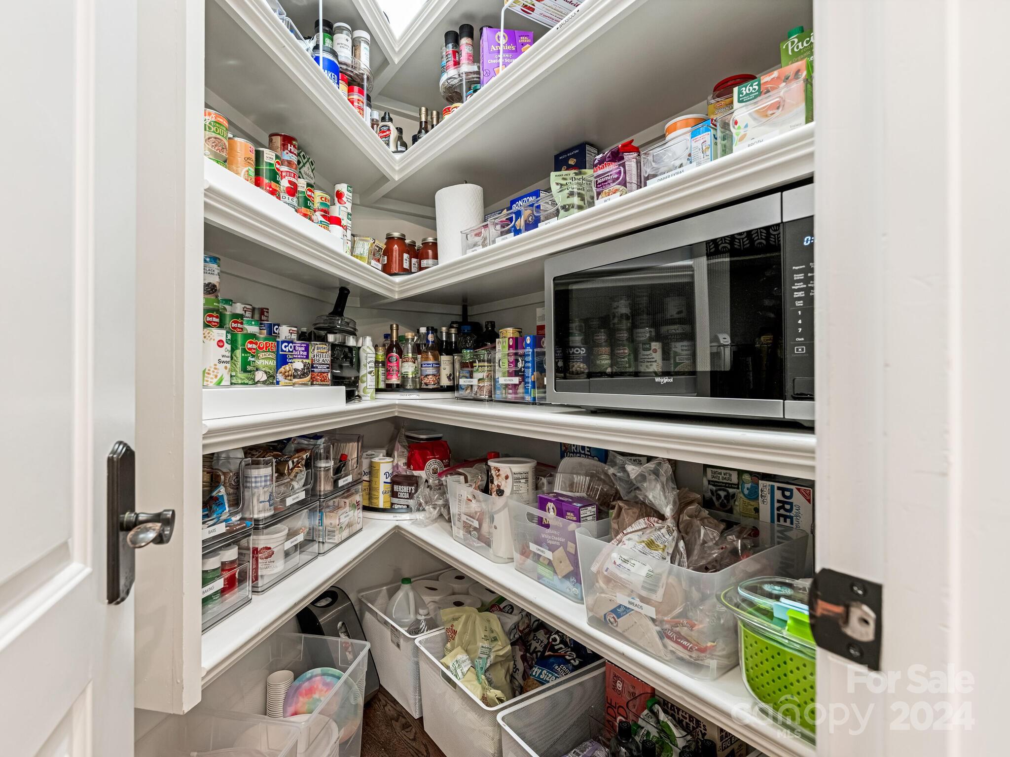 330 South Canterbury Road Charlotte, NC 28211 - Photo 18 of 41 a utility room with lots of clutter and refrigerator