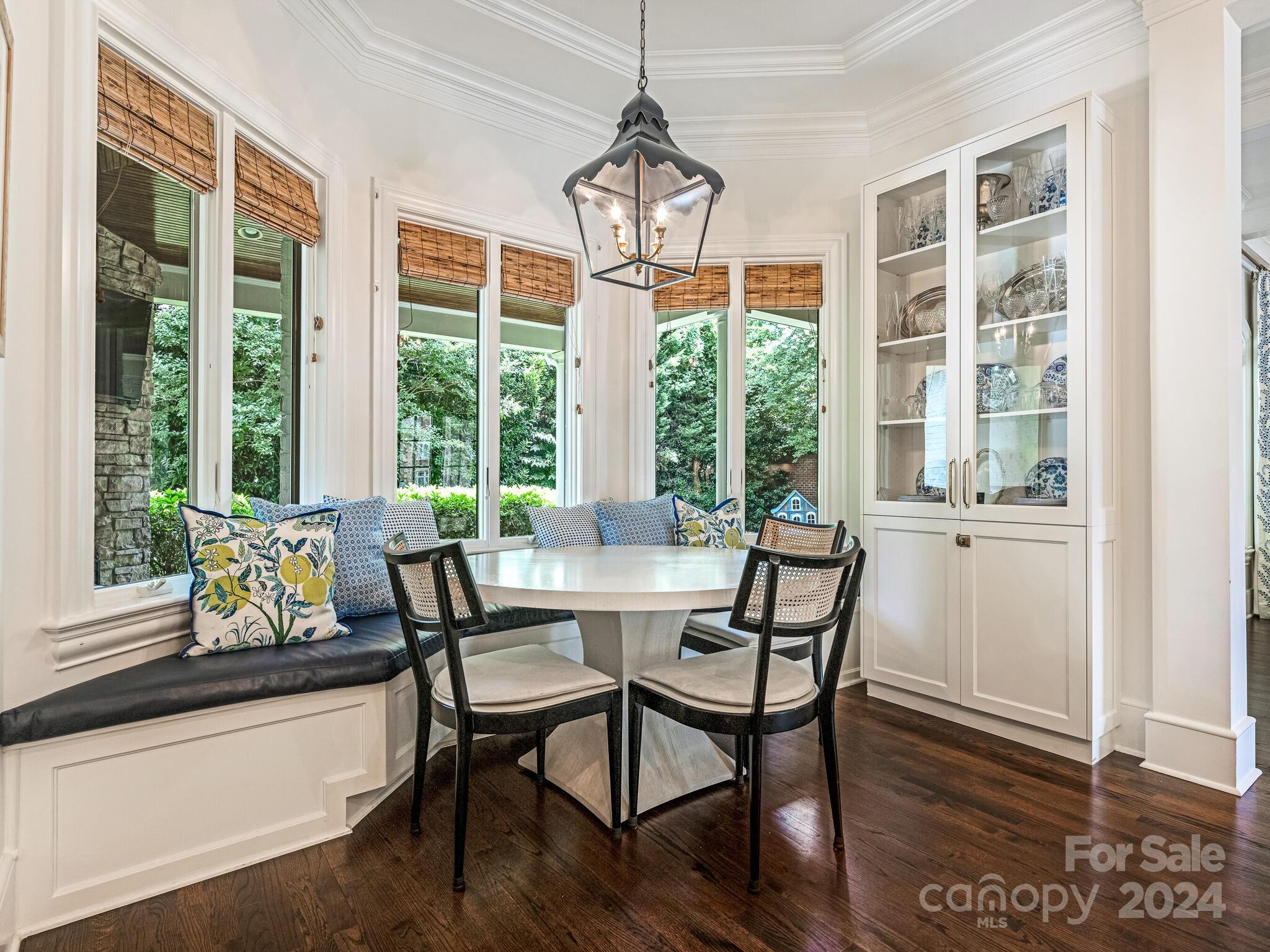 330 South Canterbury Road Charlotte, NC 28211 - Photo 21 of 41 a dining room with furniture window wooden floor