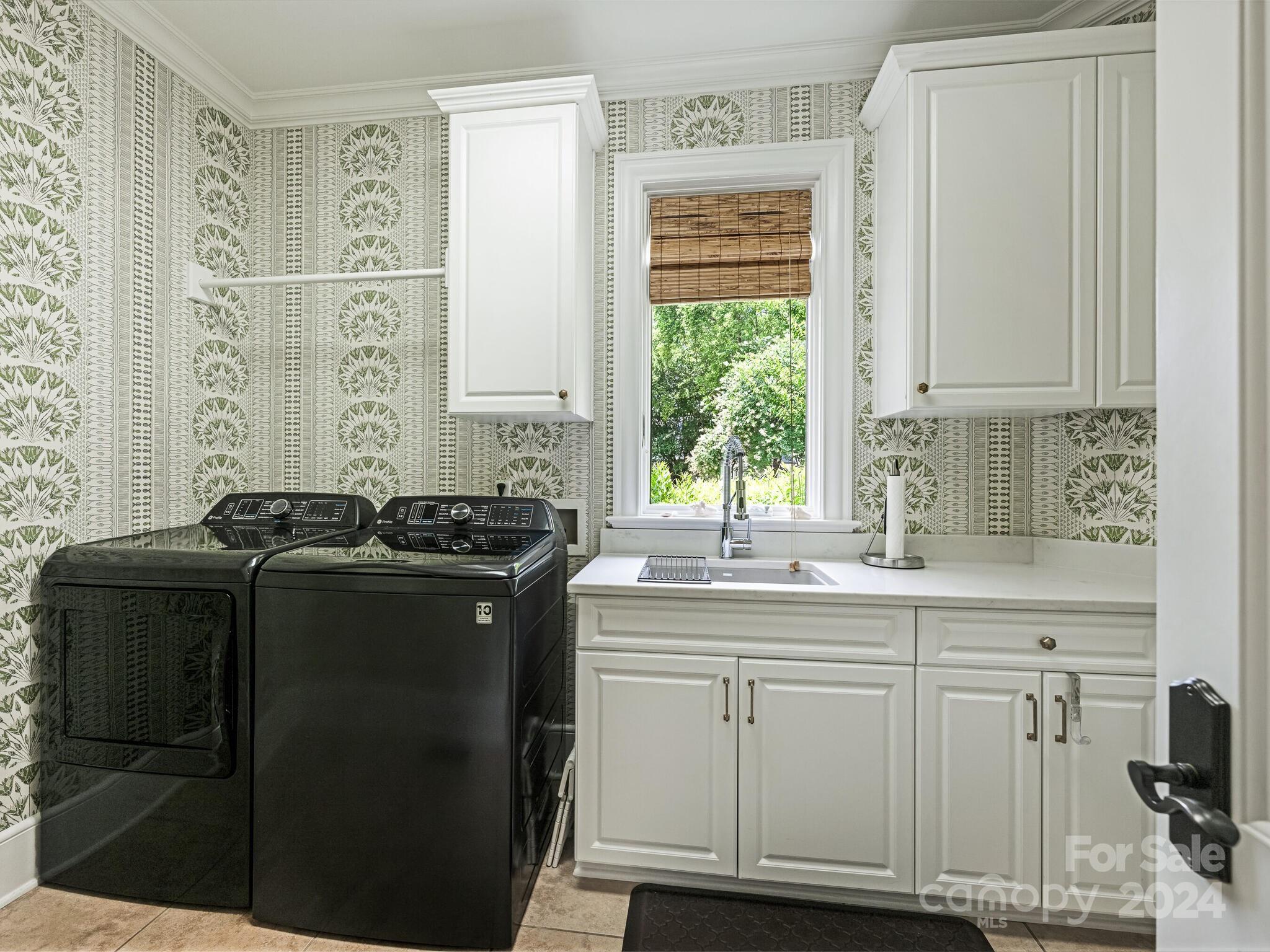 330 South Canterbury Road Charlotte, NC 28211 - Photo 25 of 41 a kitchen with stainless steel appliances granite countertop a sink stove and cabinets