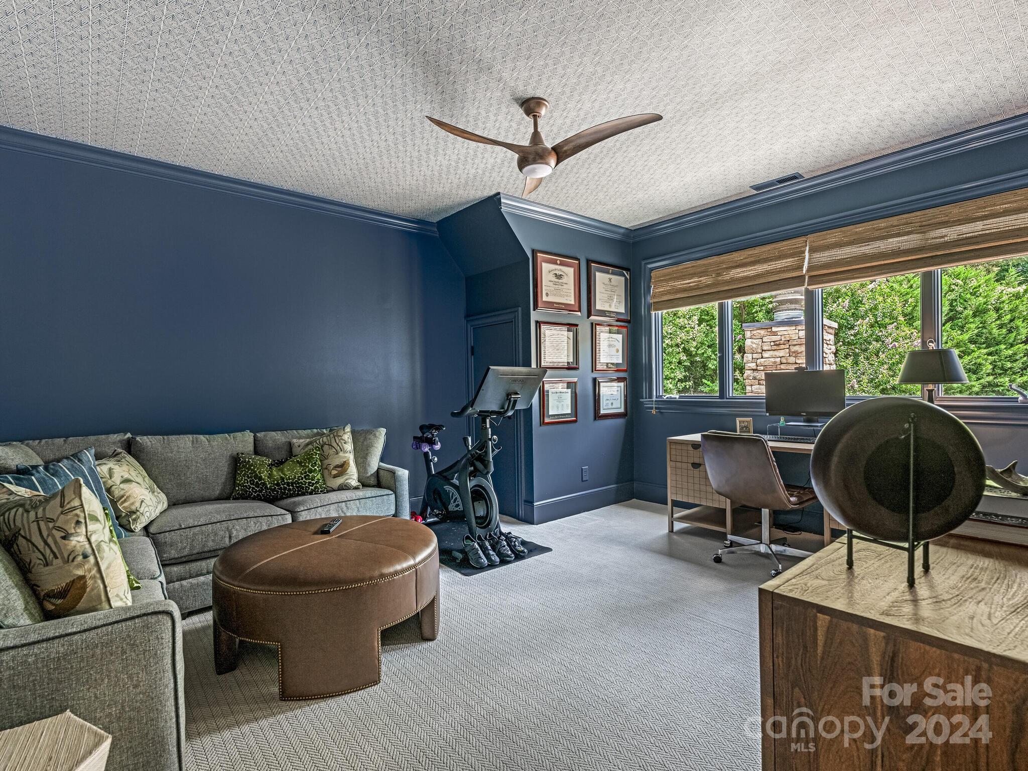 330 South Canterbury Road Charlotte, NC 28211 - Photo 28 of 41 a living room with furniture and a floor to ceiling window