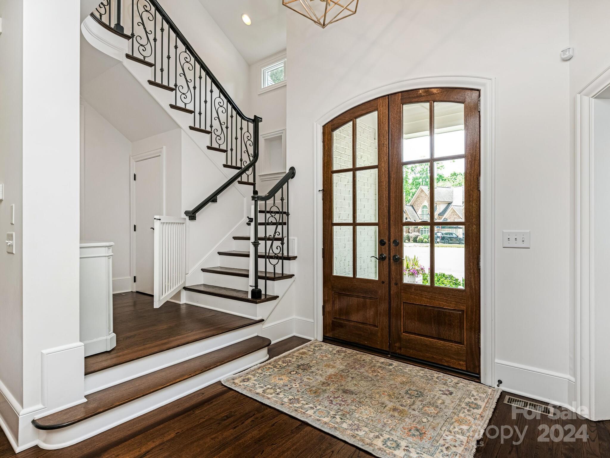 330 South Canterbury Road Charlotte, NC 28211 - Photo 3 of 41 a view of entryway and hall with wooden floor