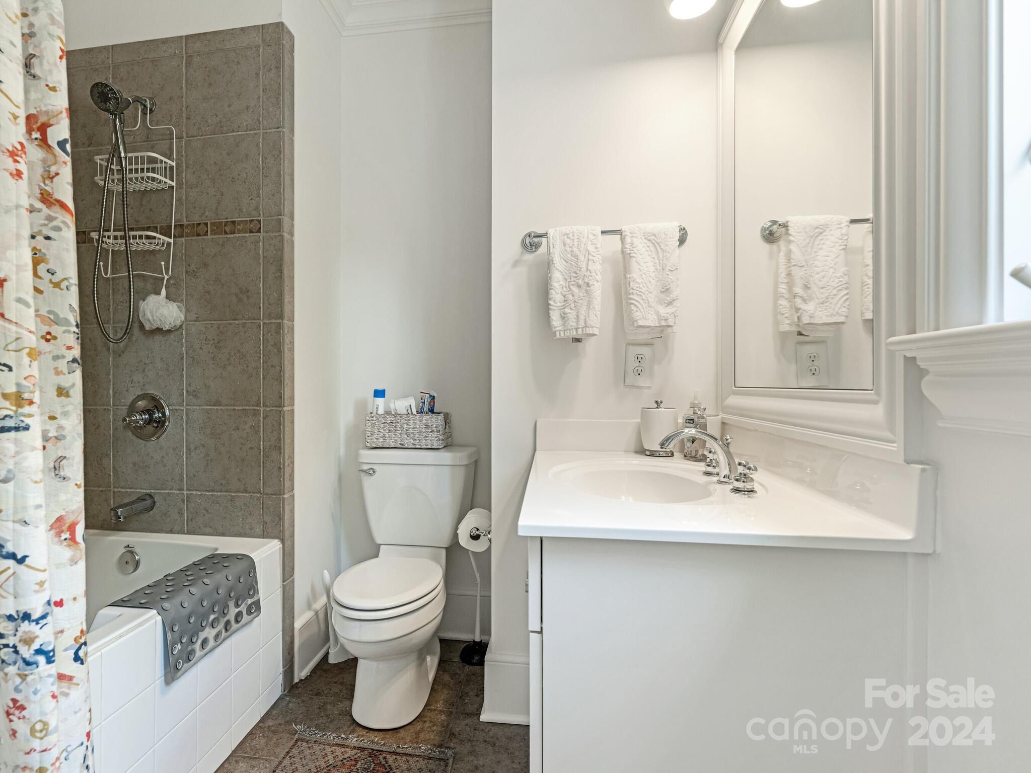 330 South Canterbury Road Charlotte, NC 28211 - Photo 32 of 41 a bathroom with a sink toilet and shower