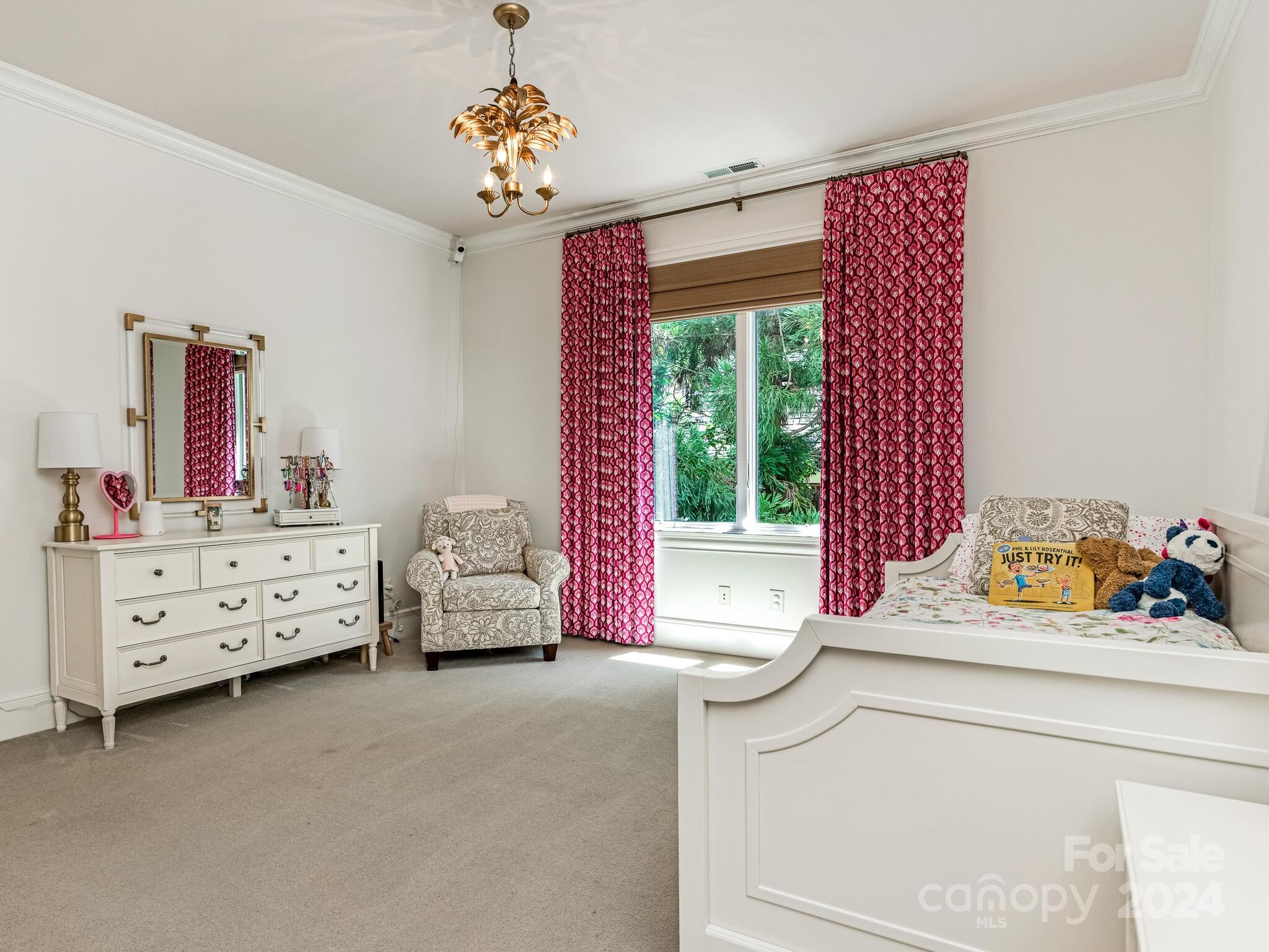330 South Canterbury Road Charlotte, NC 28211 - Photo 35 of 41 a bedroom with furniture and a window