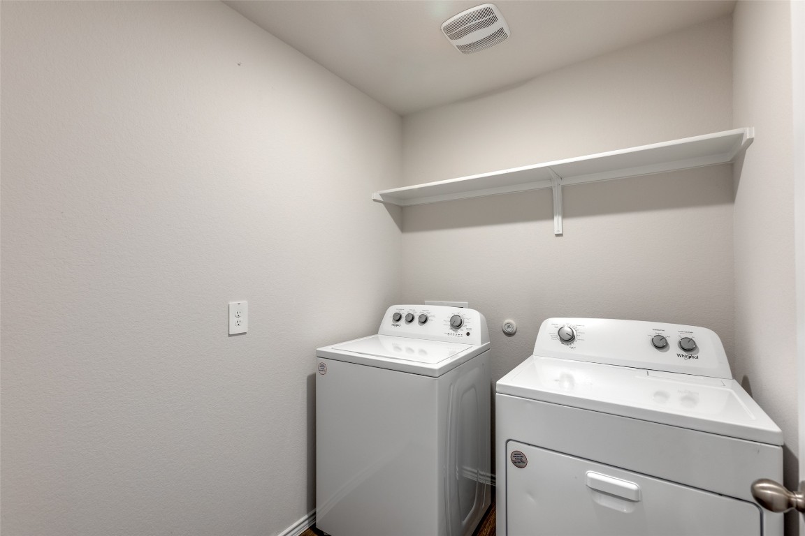 408 Frogmore Loop Kyle, TX 78640 - Photo 10 of 25 a utility room with dryer and washer