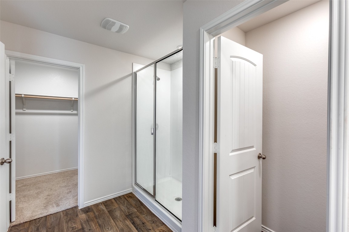 408 Frogmore Loop Kyle, TX 78640 - Photo 15 of 25 a view of hallway with wooden floor