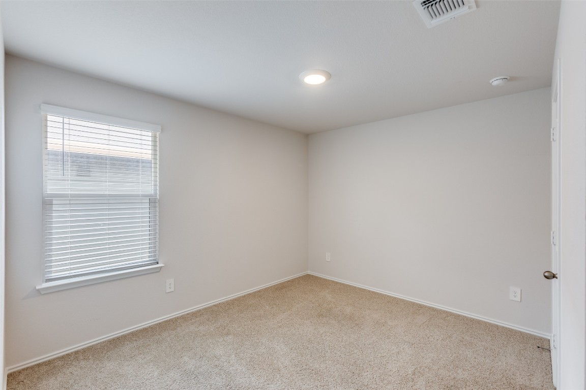 408 Frogmore Loop Kyle, TX 78640 - Photo 18 of 25 an empty room with a window