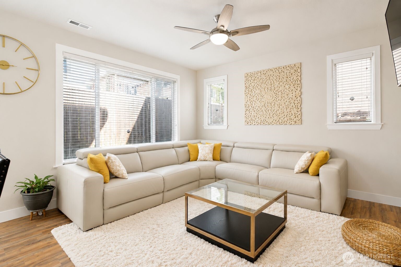 19607 25th Drive Southeast Bothell, WA 98012 - Photo 10 of 30 a living room with furniture ceiling fan and a window