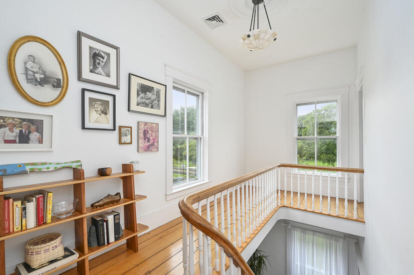 69 Doane Road Harwich Port, MA 02646 - Photo 16 of 38 a view of an wooden floor and shelves in a room