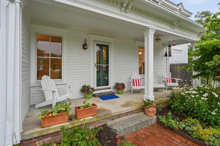69 Doane Road Harwich Port, MA 02646 - Photo 28 of 38 front view of a house with outdoor seating