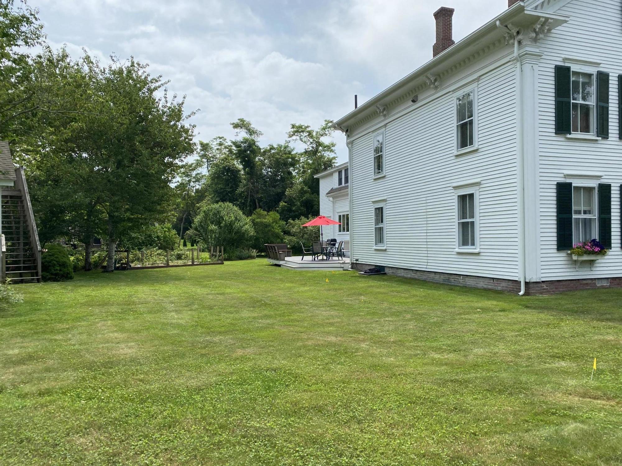 69 Doane Road Harwich Port, MA 02646 - Photo 30 of 38 a view of a backyard of the house