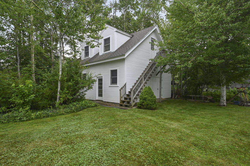 69 Doane Road Harwich Port, MA 02646 - Photo 33 of 38 a view of a house with a yard and tree s